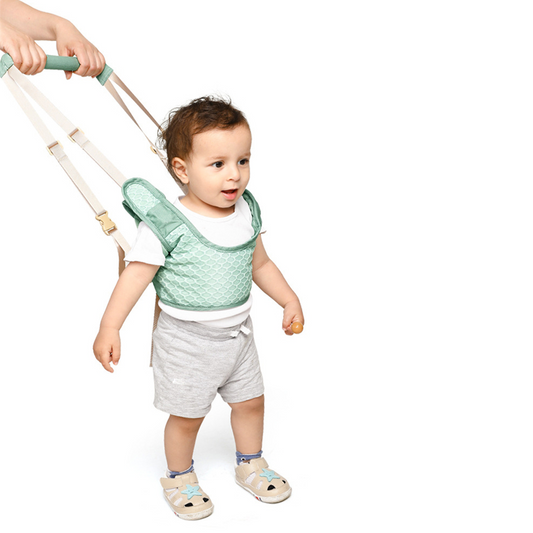 Baby walking with walker assistant